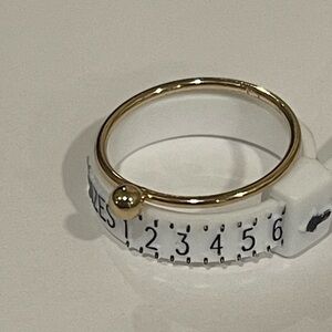 Gold toned ball stone ring​​​​​​